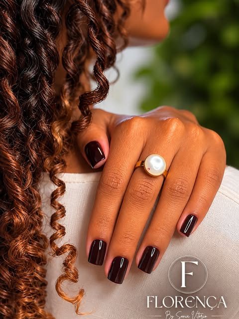 Tranças e unhas feitas no salão